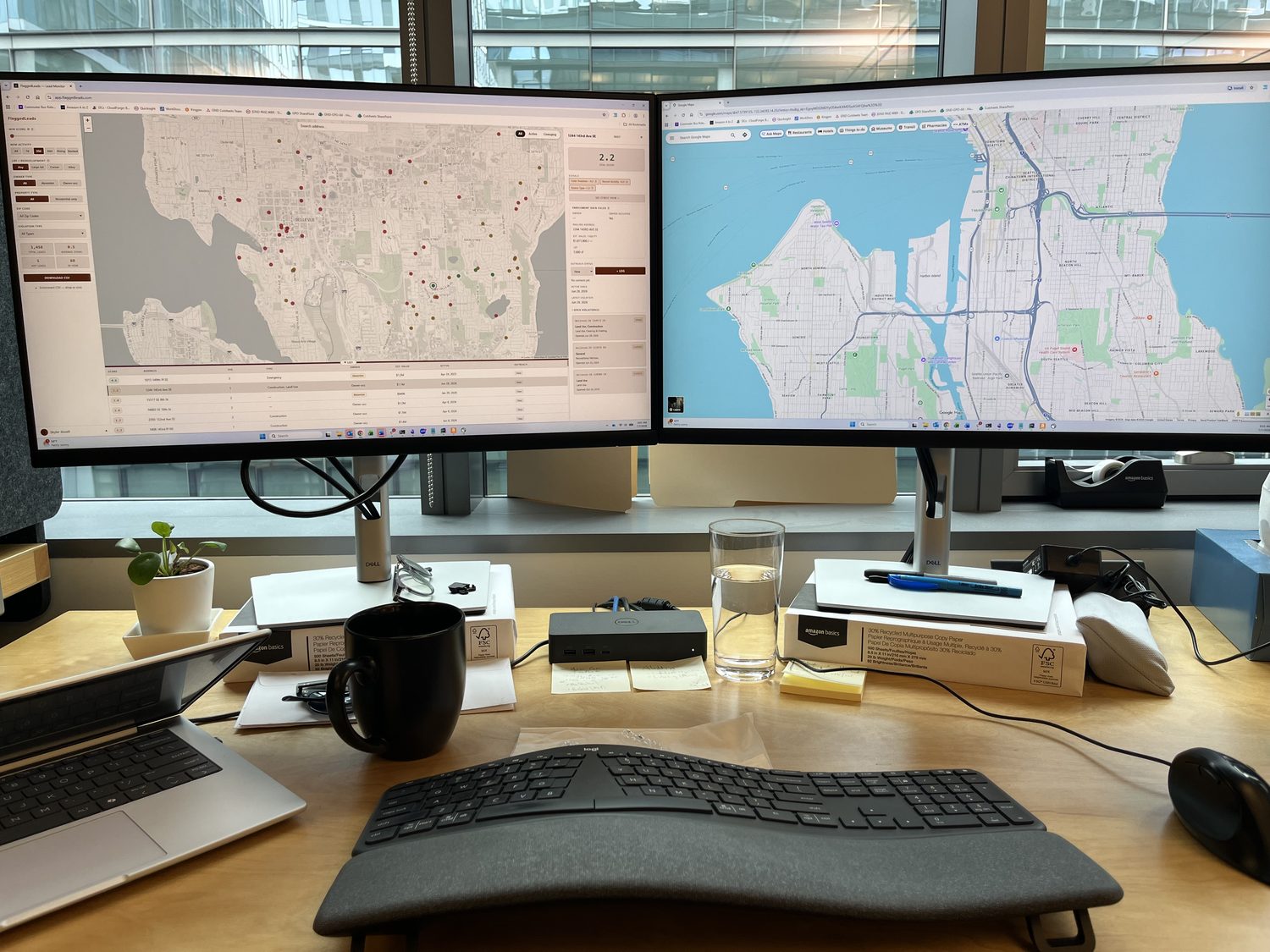 FlaggedLeads open on a dual-monitor desktop showing the Seattle violation map, a ranked lead list, and one property's deal score